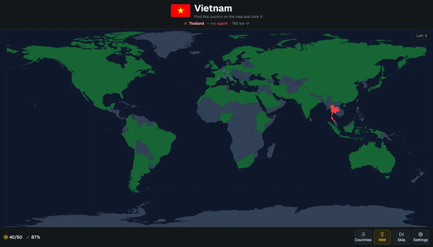 country quiz mid-game: Vietnam is asked, most of the world is already green, Thailand is red after a wrong click, and the strip under the title reads 'Thailand, try again, 762 km' with an arrow pointing right.
